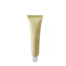 clean empty cosmetics eye cream yellow plastic tube
